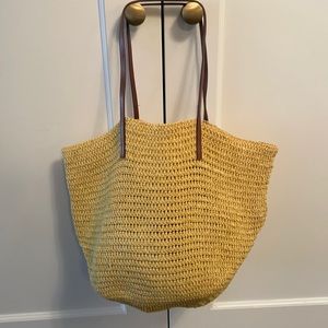 JCrew Straw tote with brown leather straps